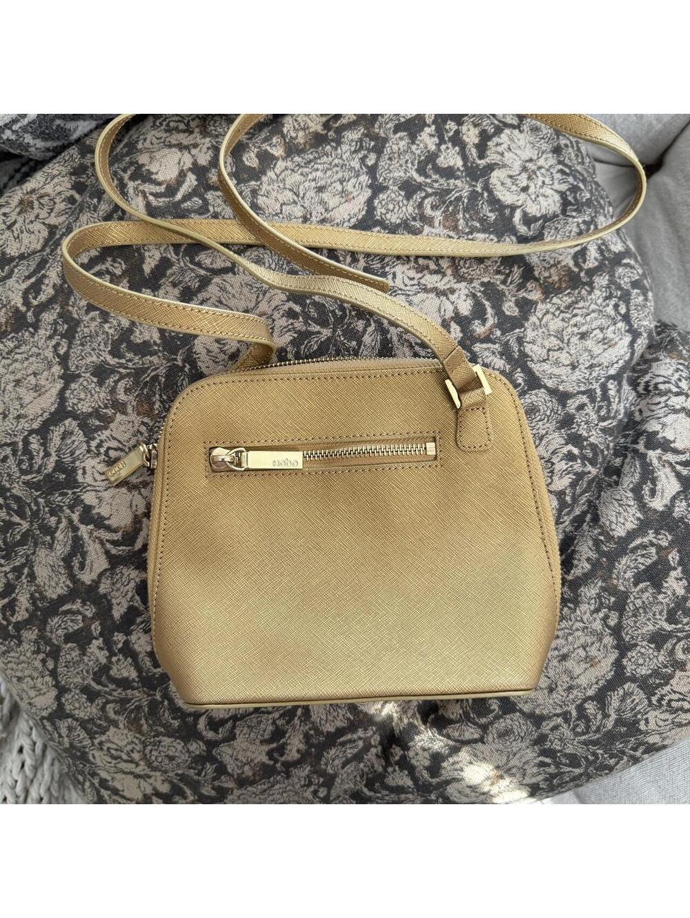 Small HOBO brand light golden yellow speckled purge bag